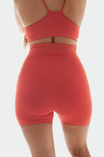 UNCHAINED BIKER SHORT - Sunset Coral